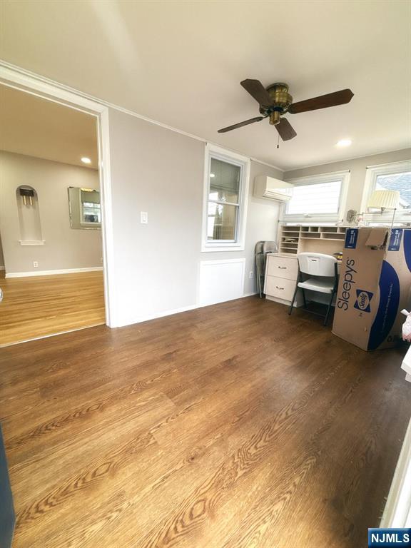 9-04 5th Street Fair Lawn, NJ 07410 - Photo 10 of 17 a living room with furniture and a large window