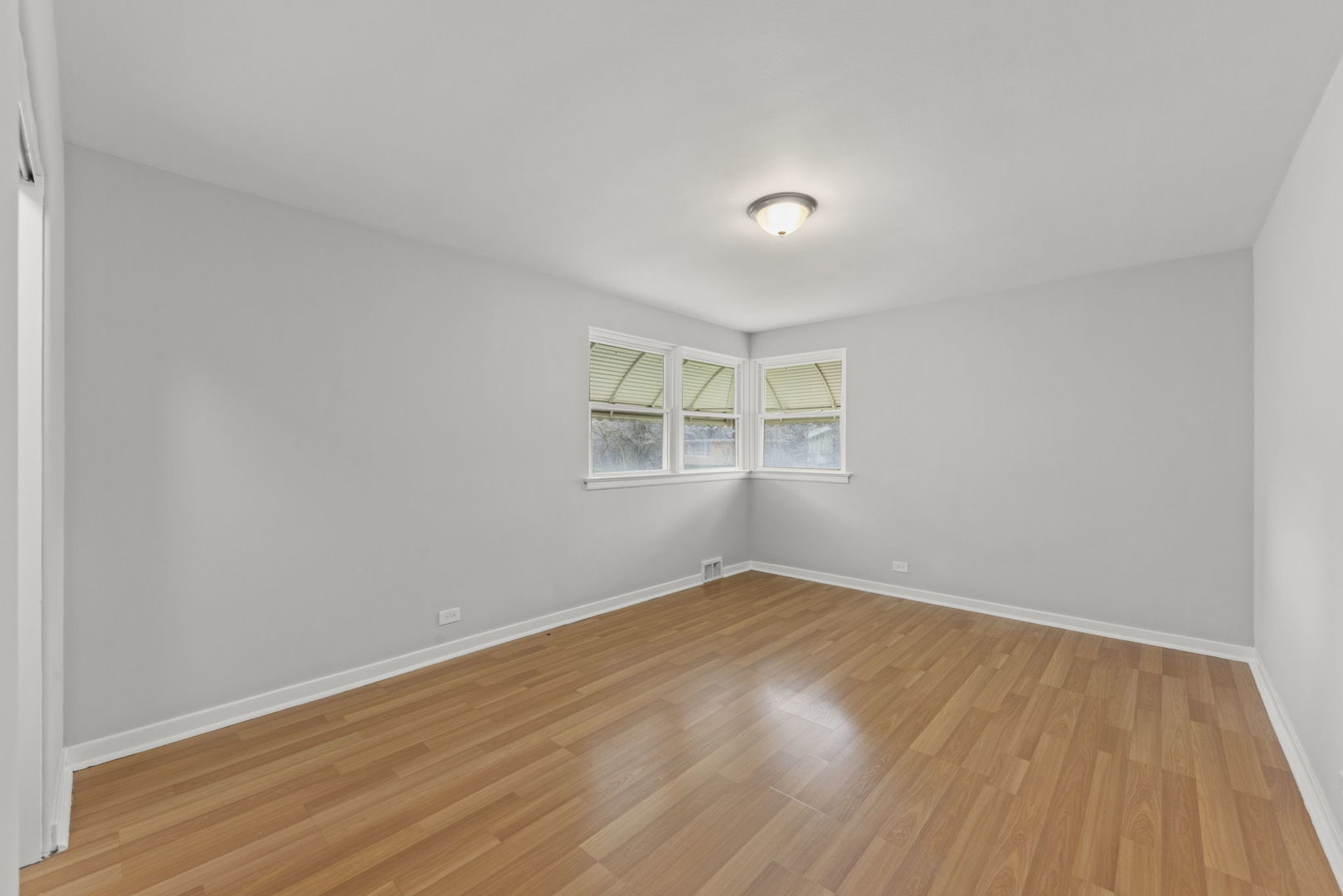 2301 18th Avenue North Riverside, IL 60546 - Photo 13 of 28 wooden floor in an empty room with a window