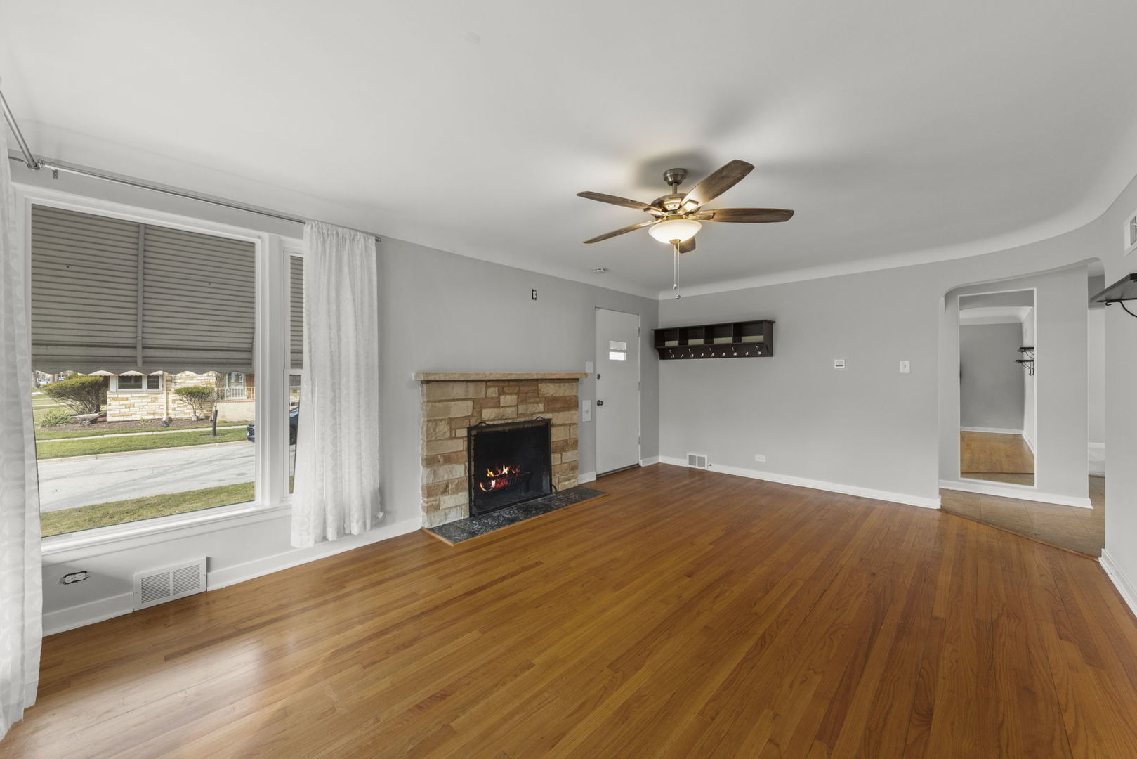 2301 18th Avenue North Riverside, IL 60546 - Photo 6 of 28 wooden floor in an empty room with a fireplace