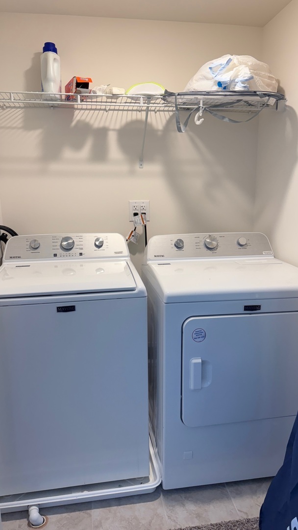 2008 Yellowstone Boulevard, Unit 2008 Mundelein, IL 60060 - Photo 18 of 25 a utility room with dryer and washer
