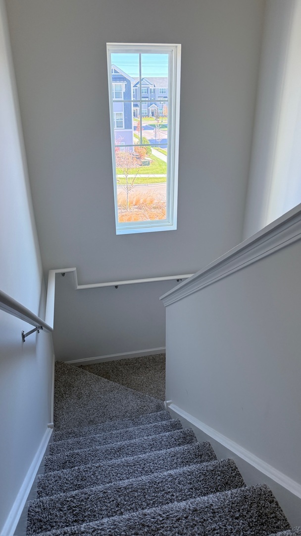 2008 Yellowstone Boulevard, Unit 2008 Mundelein, IL 60060 - Photo 19 of 25 a view of an empty room with a window
