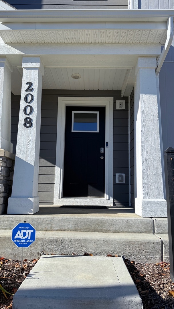 2008 Yellowstone Boulevard, Unit 2008 Mundelein, IL 60060 - Photo 2 of 25 a view of a entryway door of the house