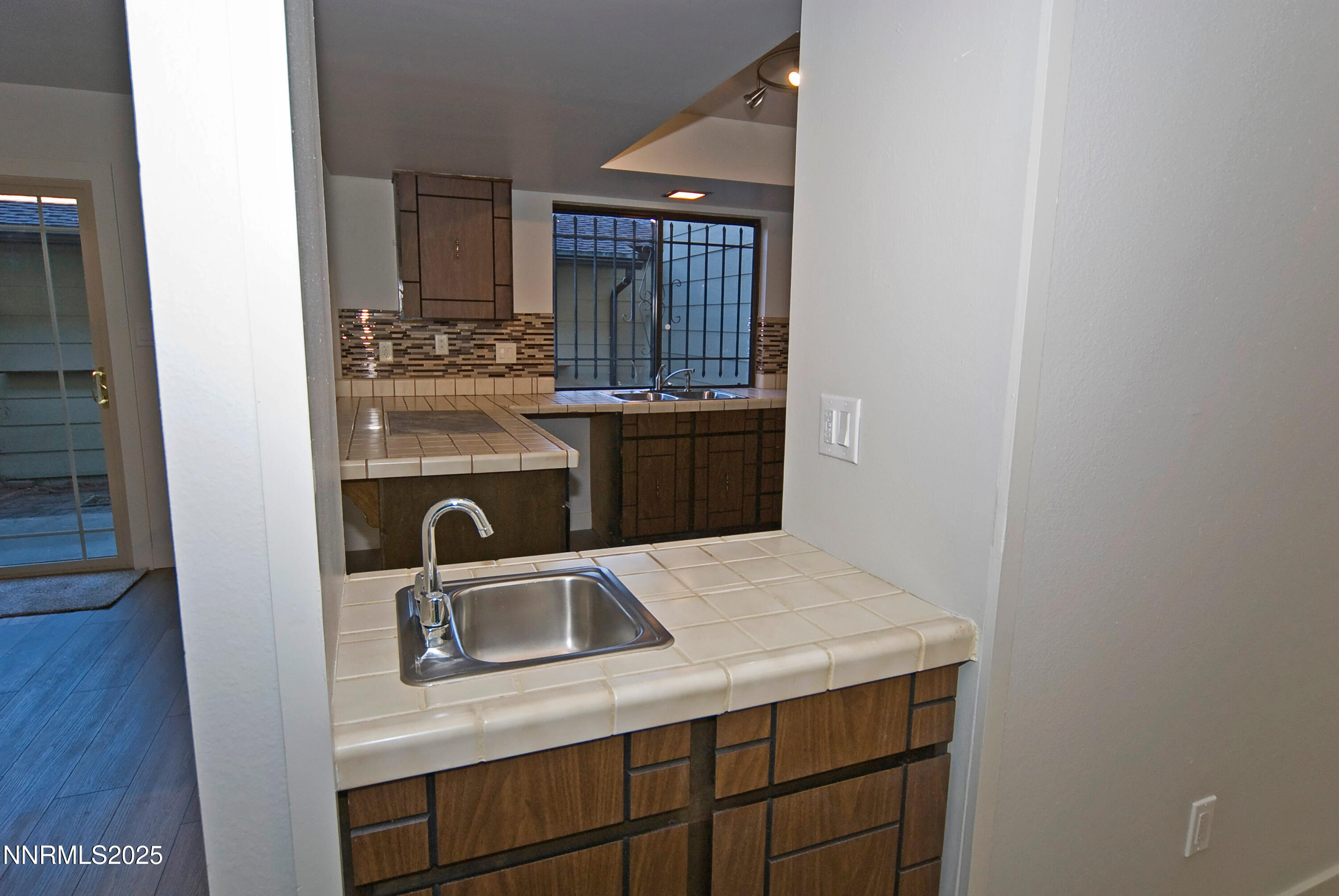1433 Foster Drive Reno, NV 89509 - Photo 15 of 23 a kitchen with a stove and a sink