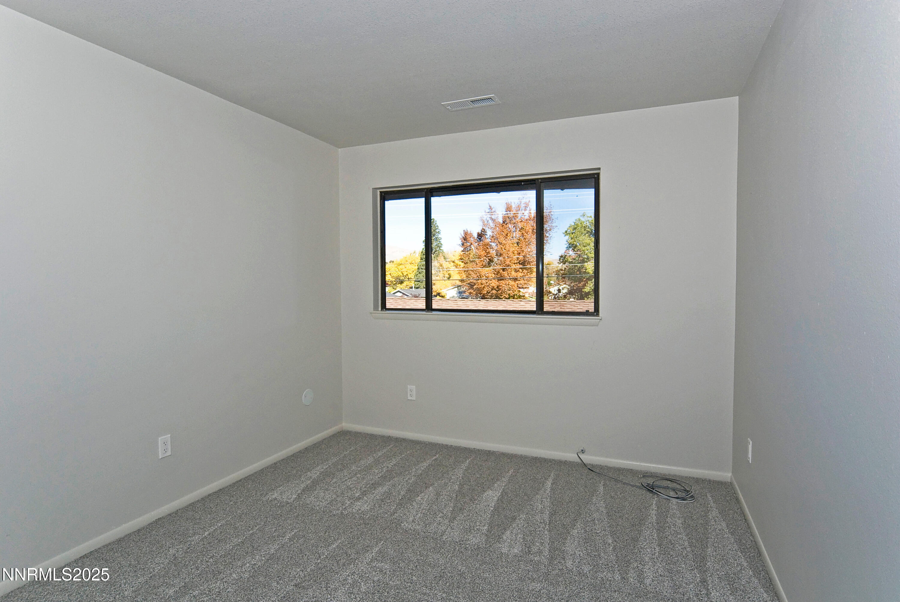1433 Foster Drive Reno, NV 89509 - Photo 17 of 23 an empty room with windows