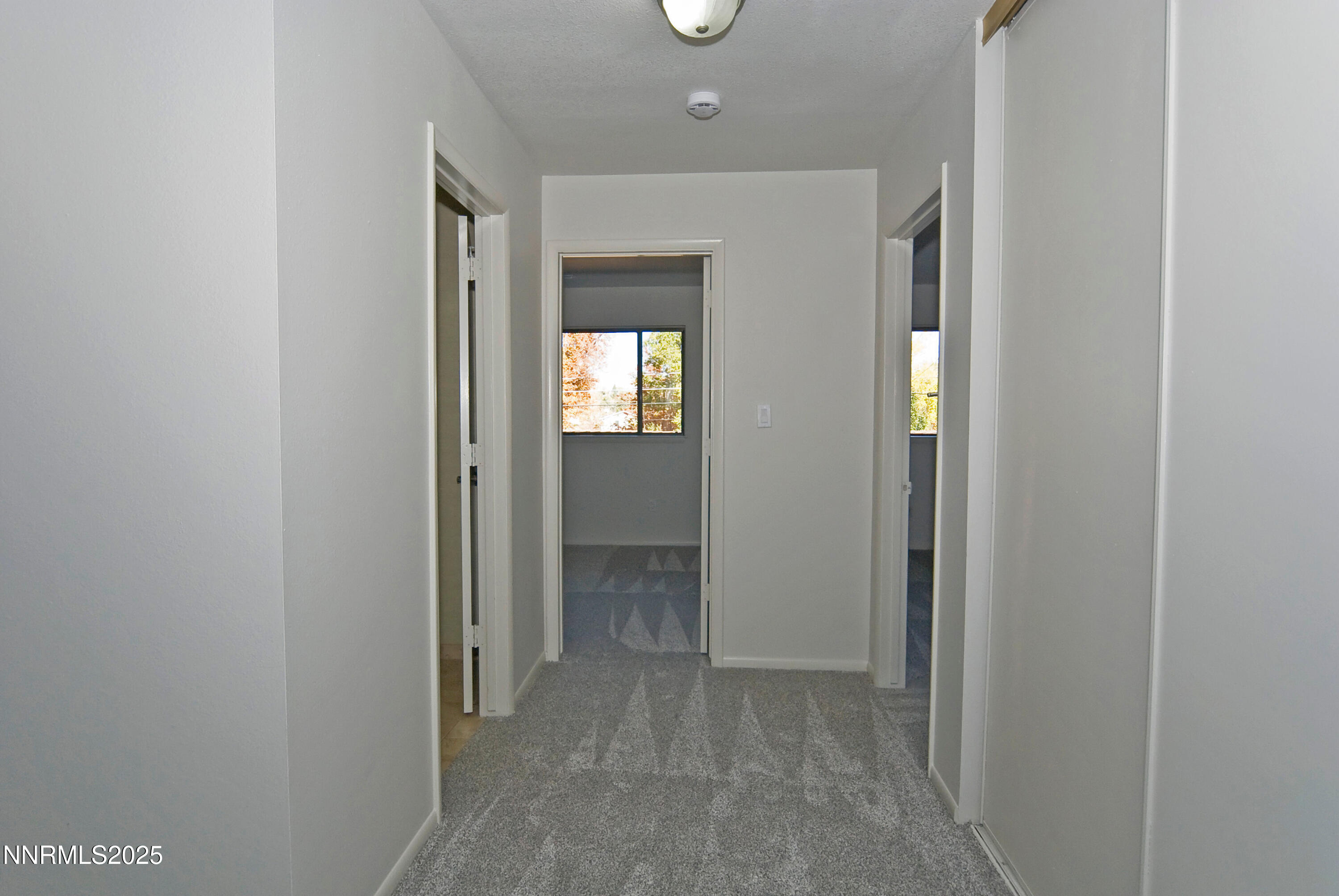 1433 Foster Drive Reno, NV 89509 - Photo 20 of 23 a view of hallway with bathroom