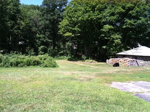 108 Thompson Road Webster, MA 01570 - Photo 4 of 5 a view of a house with a yard
