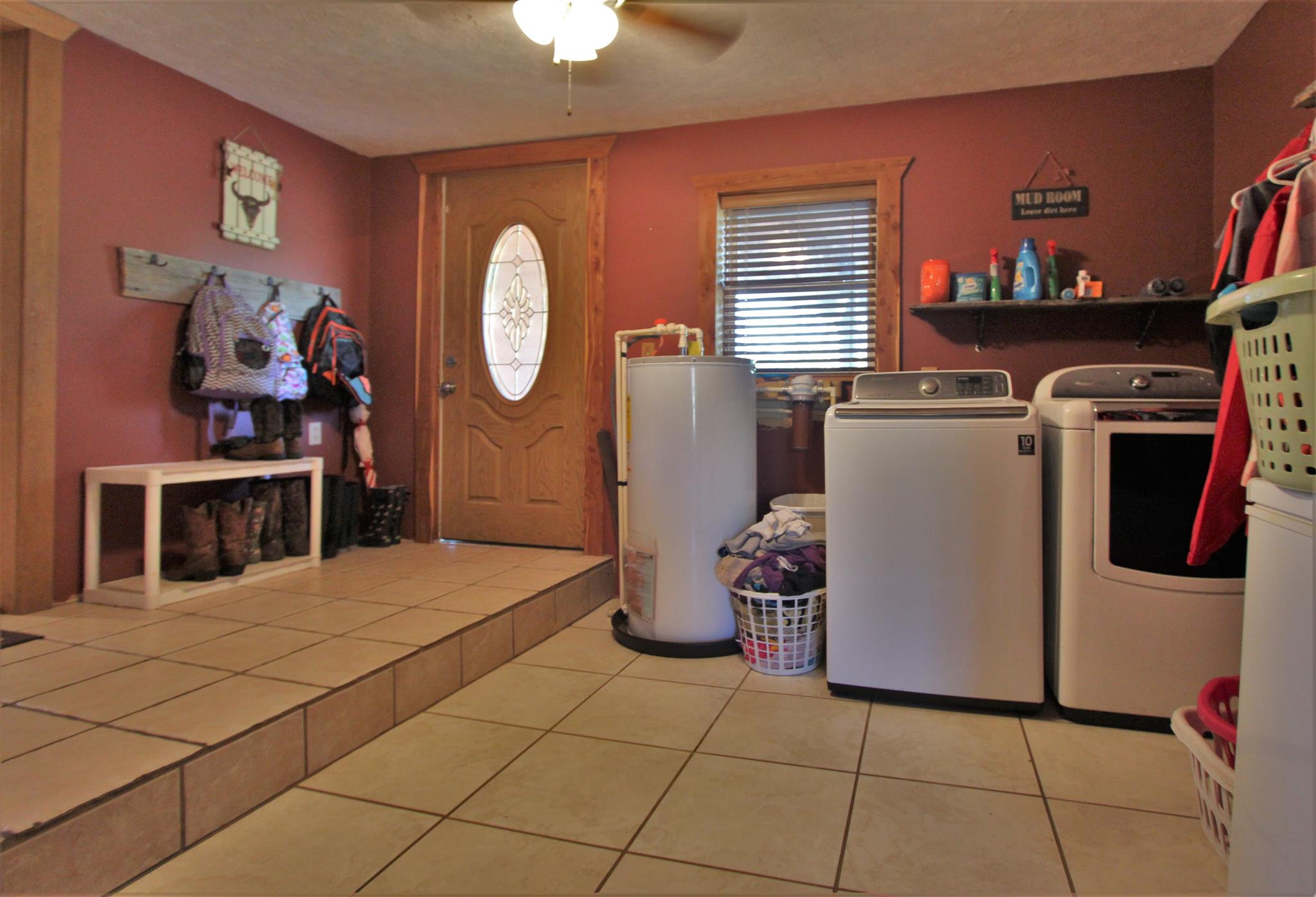 2296 Tracy Road Watertown, TN 37184 - Photo 14 of 29 a bed room with a bed and a fish tank