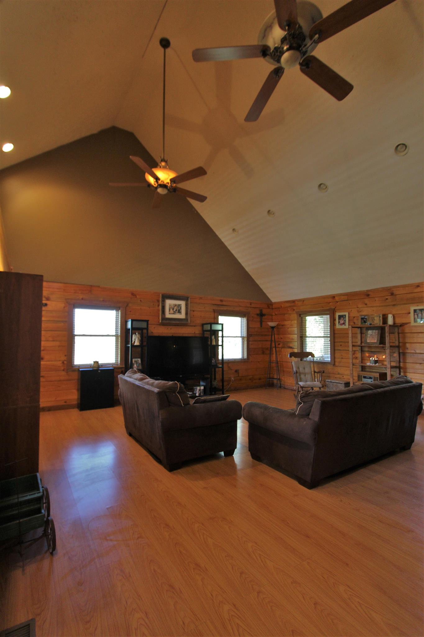 2296 Tracy Road Watertown, TN 37184 - Photo 18 of 29 a living room with furniture and a chandelier