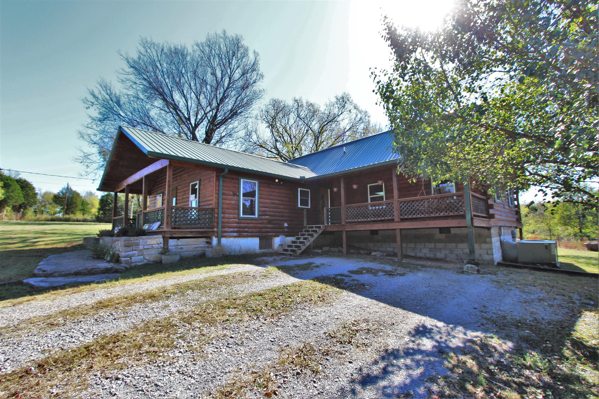 2296 Tracy Road Watertown, TN 37184 - Photo 2 of 29 a front view of a house with a yard and garage