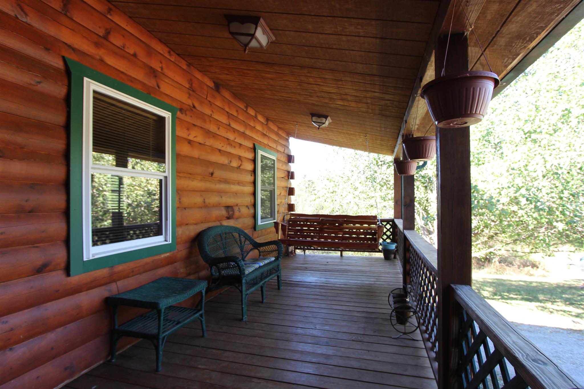 2296 Tracy Road Watertown, TN 37184 - Photo 7 of 29 a view of a porch with furniture and a yard