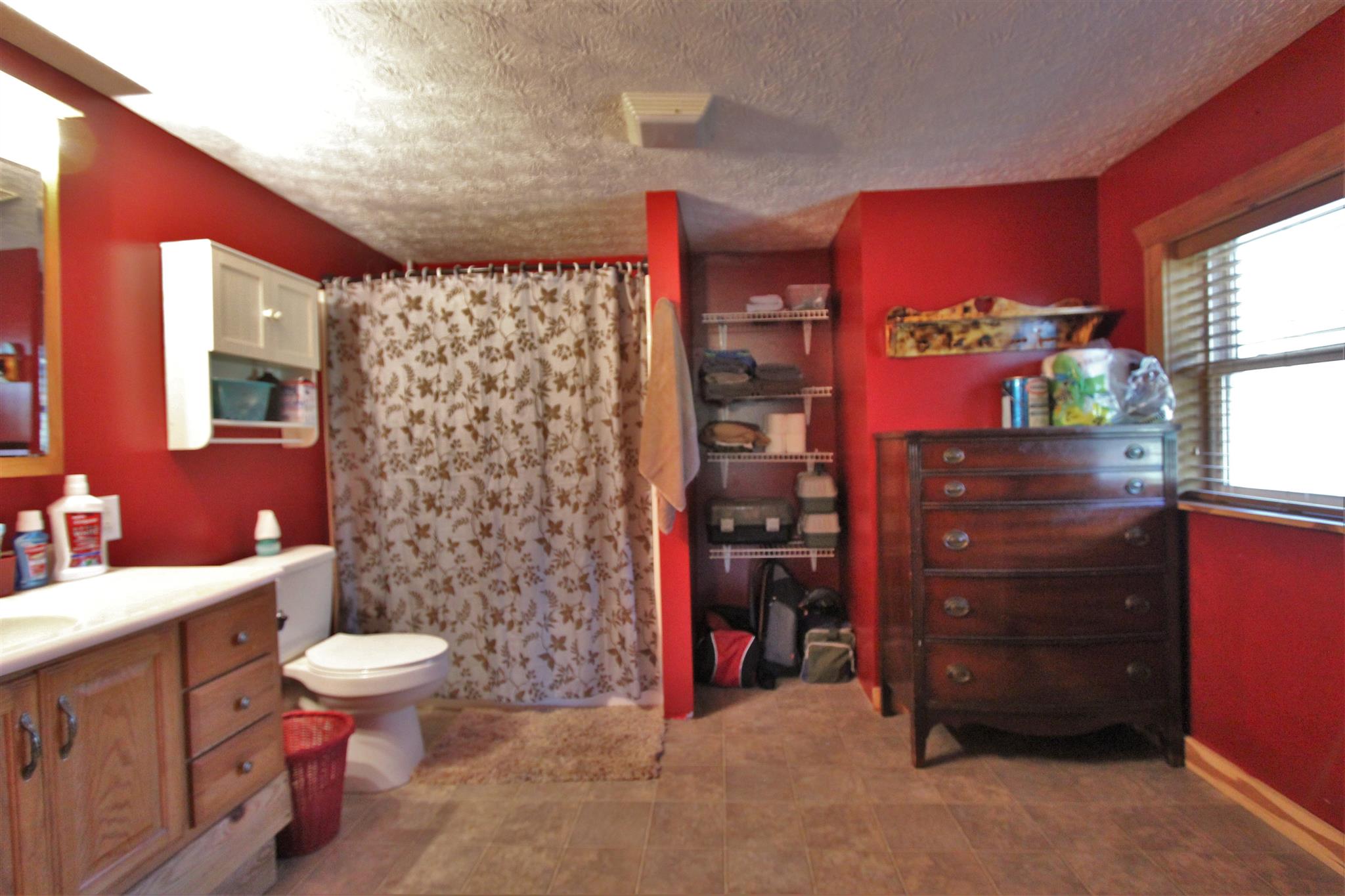 2296 Tracy Road Watertown, TN 37184 - Photo 9 of 29 a bathroom with a toilet sink and mirror