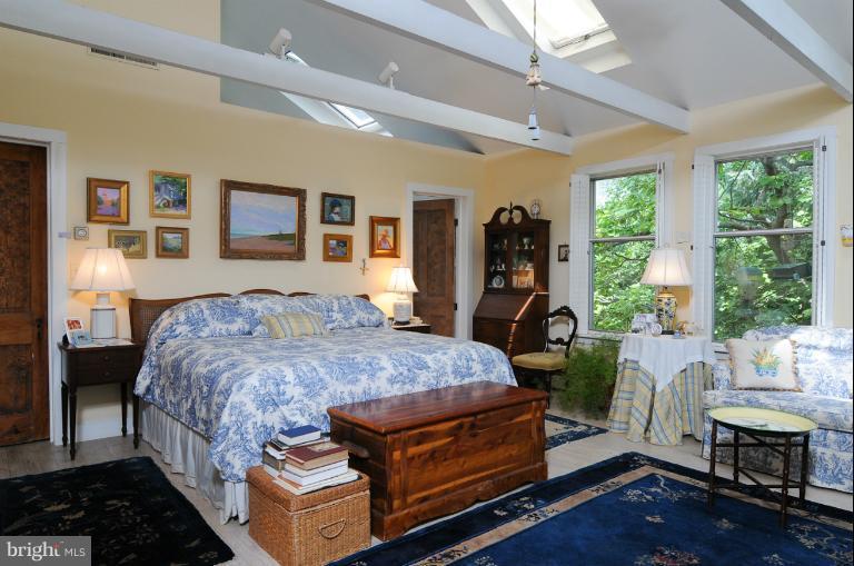 1775 Beachfield Road Annapolis, MD 21409 - Photo 22 of 25 a bed room with a bed and a window
