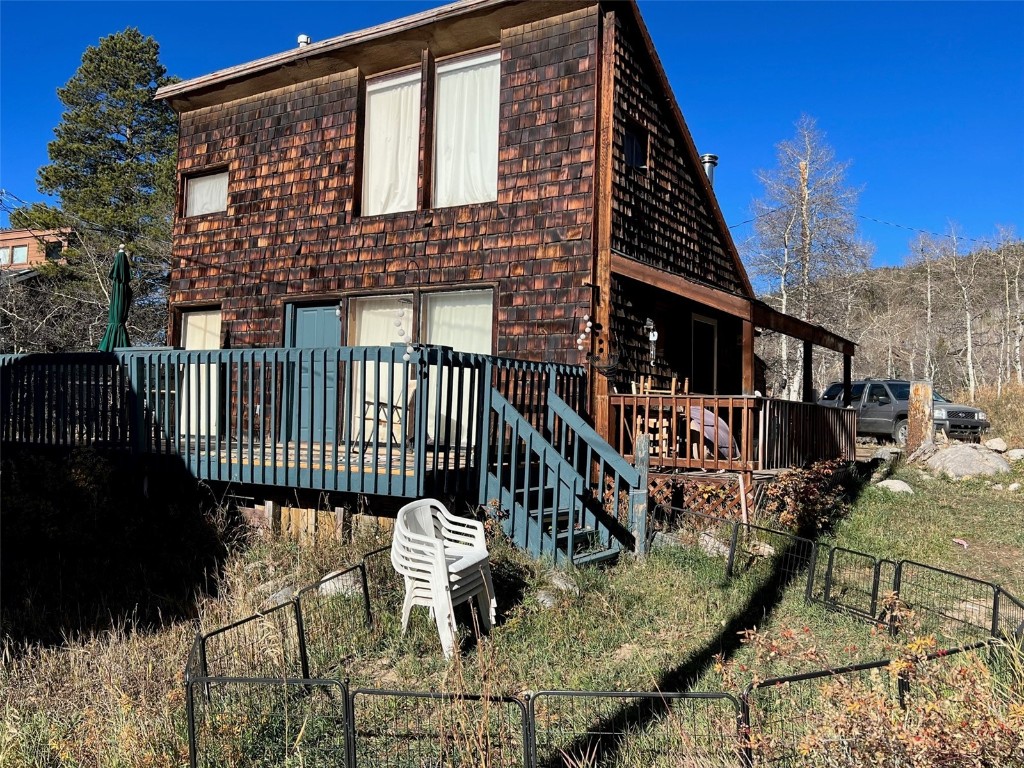 47 Rasor Court Keystone, CO 80435 - Photo 14 of 20 a view of a house with backyard and sitting area