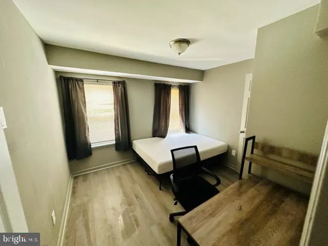 a view of a big room with windows