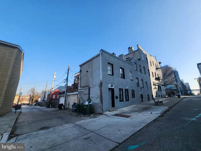 a view of a street in front of a building