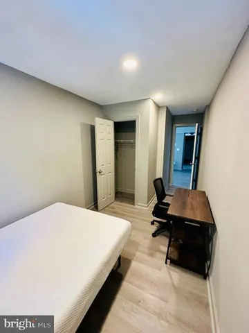 a kitchen with sink and refrigerator