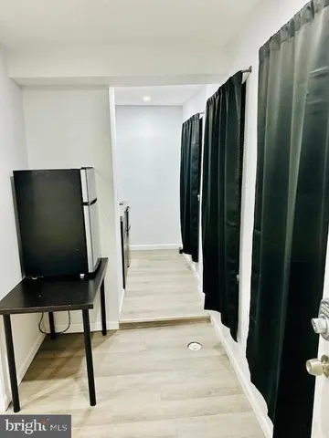 a kitchen with a sink cabinets and stainless steel appliances