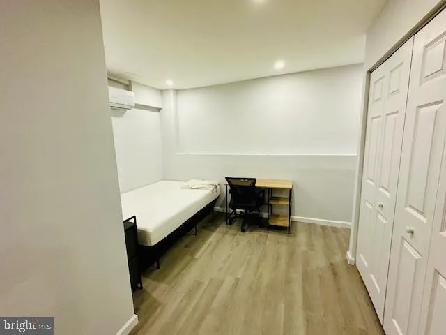 a bathroom with a toilet sink and shower