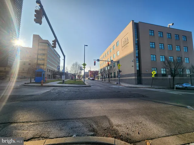 a view of a building with a yard