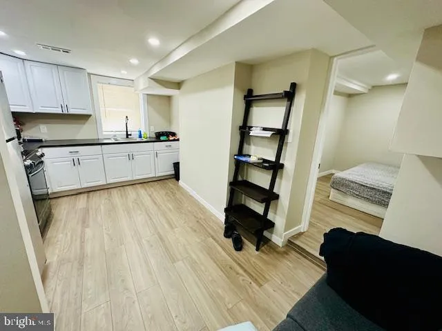 a view of a hallway view with staircase