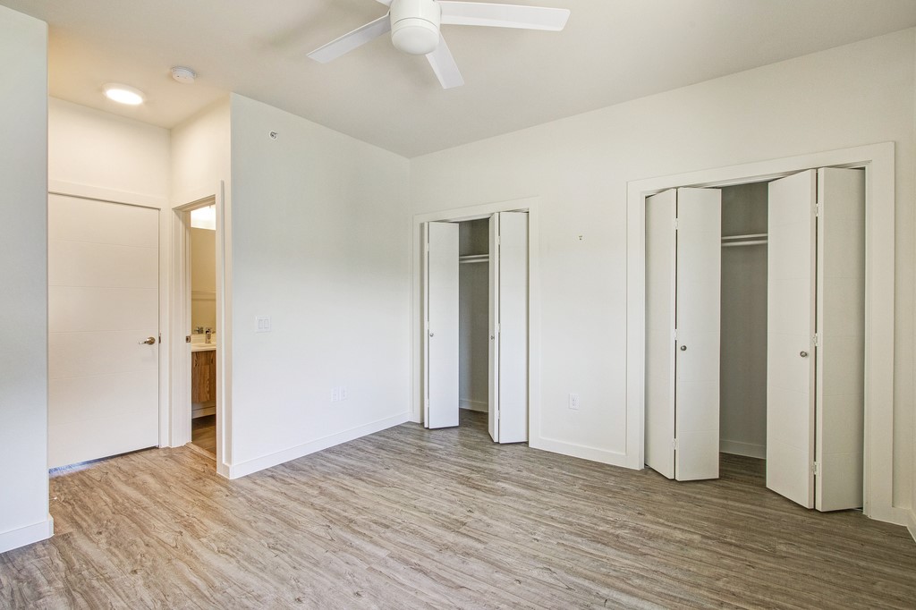 7805 Cooper Lane, Unit 602 Austin, TX 78745 - Photo 15 of 30 a view of empty room with wooden floor