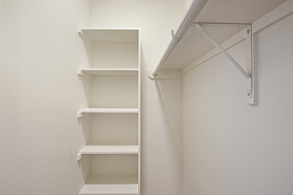 7805 Cooper Lane, Unit 602 Austin, TX 78745 - Photo 20 of 30 a view of walk in closet with empty racks