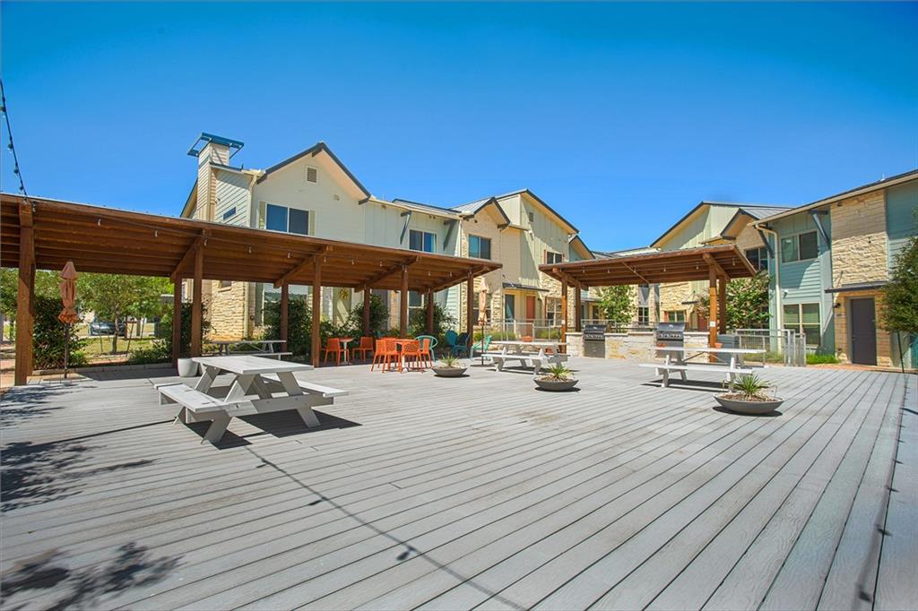 7805 Cooper Lane, Unit 602 Austin, TX 78745 - Photo 26 of 30 a view of a house with swimming pool and sitting area