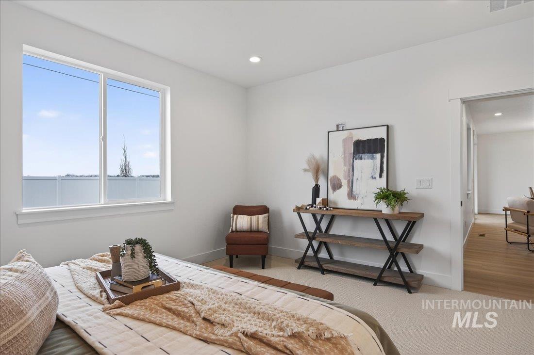 1268 West Swift Fox Street Meridian, ID 83642 - Photo 13 of 34 Bedroom featuring carpet flooring and recessed lighting
