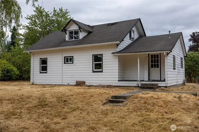 a house with yard in front of it
