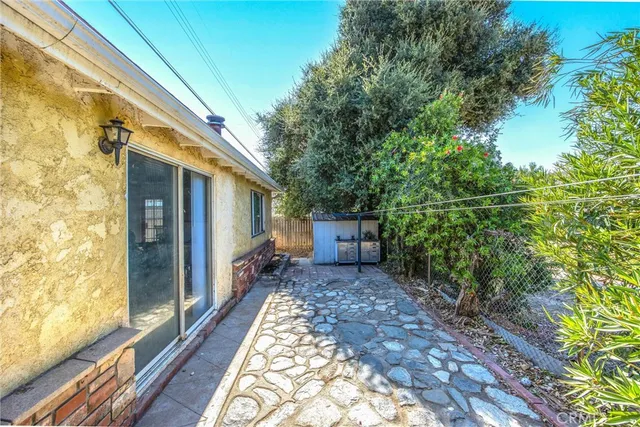 a backyard of a house with seating space