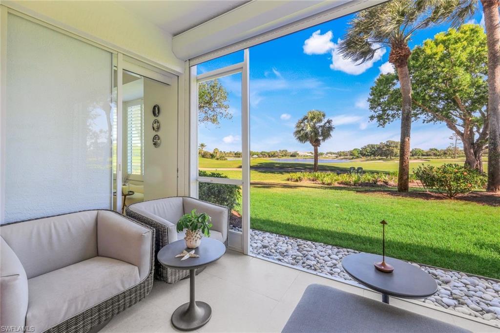 26871 Clarkston Drive, Unit 102 Bonita Springs, FL 34135 - Photo 23 of 50 a garden view with a seating space