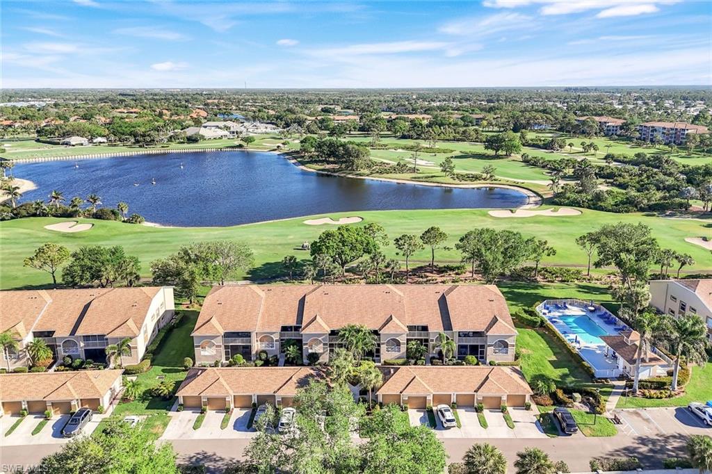 26871 Clarkston Drive, Unit 102 Bonita Springs, FL 34135 - Photo 28 of 50 an aerial view of residential houses with outdoor space and ocean view