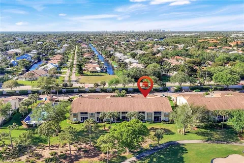 a picture of a bathroom with a shower and a mirror