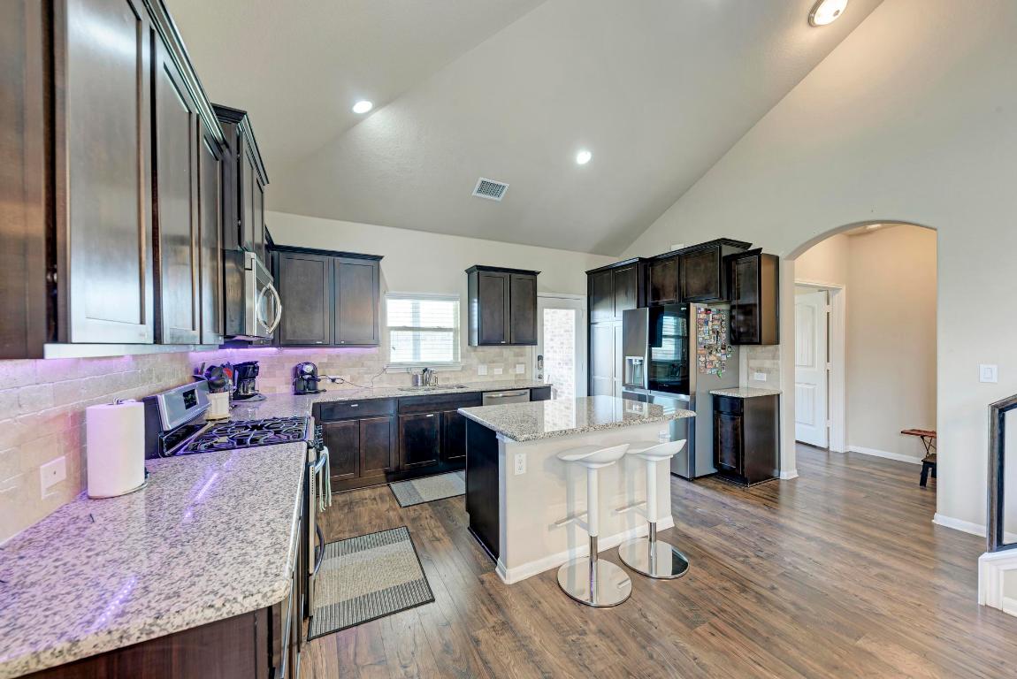 1023 Palo Duro Loop Round Rock, TX 78664 - Photo 11 of 33 Kitchen view - center island, granite countertops