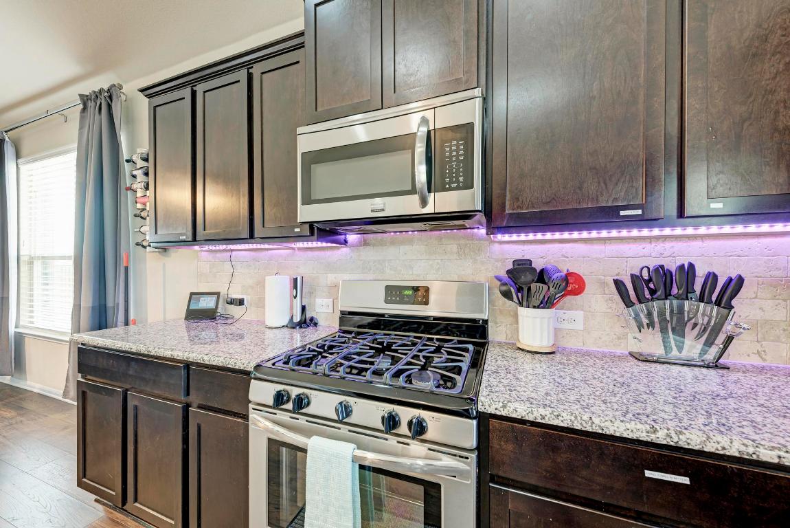 1023 Palo Duro Loop Round Rock, TX 78664 - Photo 14 of 33 Gas range, built in microwave above, all stainless steel