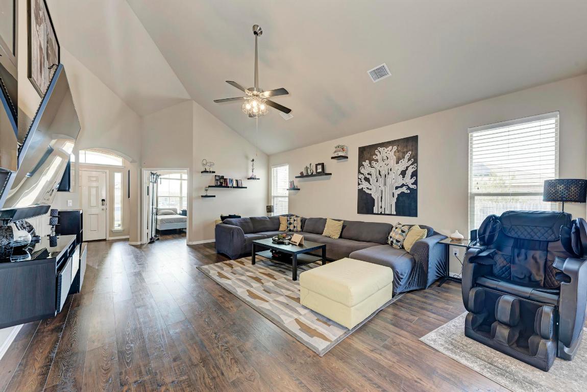 1023 Palo Duro Loop Round Rock, TX 78664 - Photo 6 of 33 living room view, with office/bedroom doors in the distance.