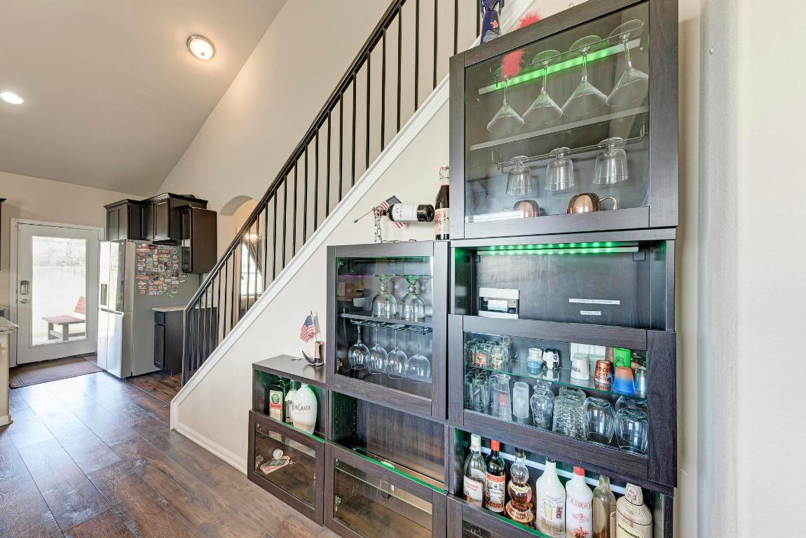 1023 Palo Duro Loop Round Rock, TX 78664 - Photo 9 of 33 Bar area, with stairs to the second floor