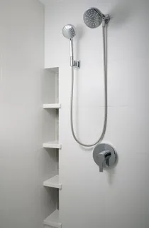 a picture of a bathroom with a shower
