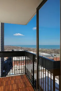 a view of a balcony with an ocean view