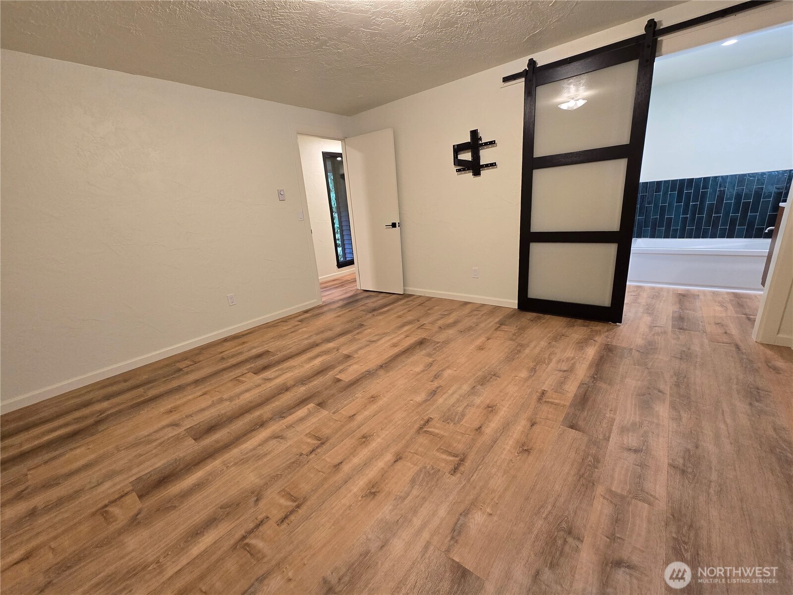 639 Lower Elwha Road Port Angeles, WA 98363 - Photo 18 of 38 a view of an empty room with a window