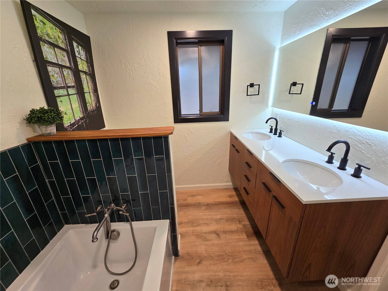 639 Lower Elwha Road Port Angeles, WA 98363 - Photo 21 of 38 a bathroom with a double vanity sink and a mirror