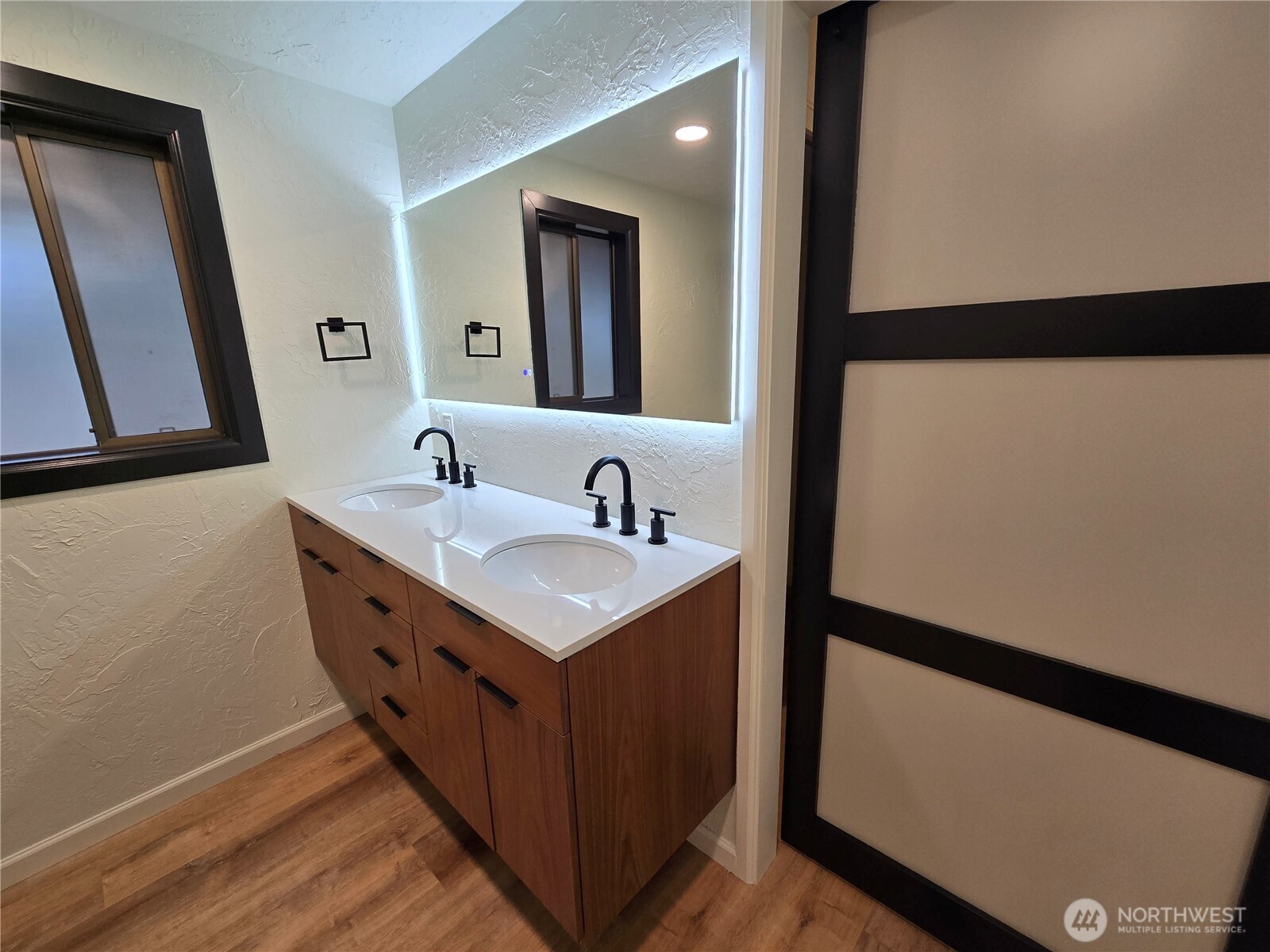 639 Lower Elwha Road Port Angeles, WA 98363 - Photo 22 of 38 a bathroom with a sink and a mirror