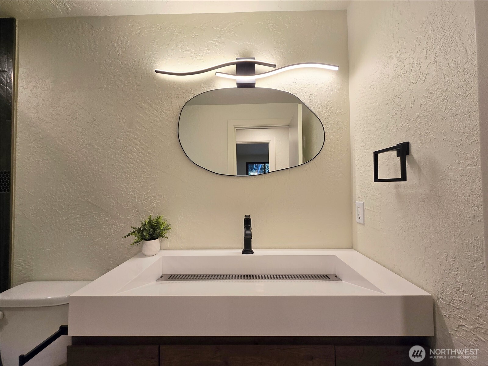 639 Lower Elwha Road Port Angeles, WA 98363 - Photo 30 of 38 a bathroom with a sink and a mirror