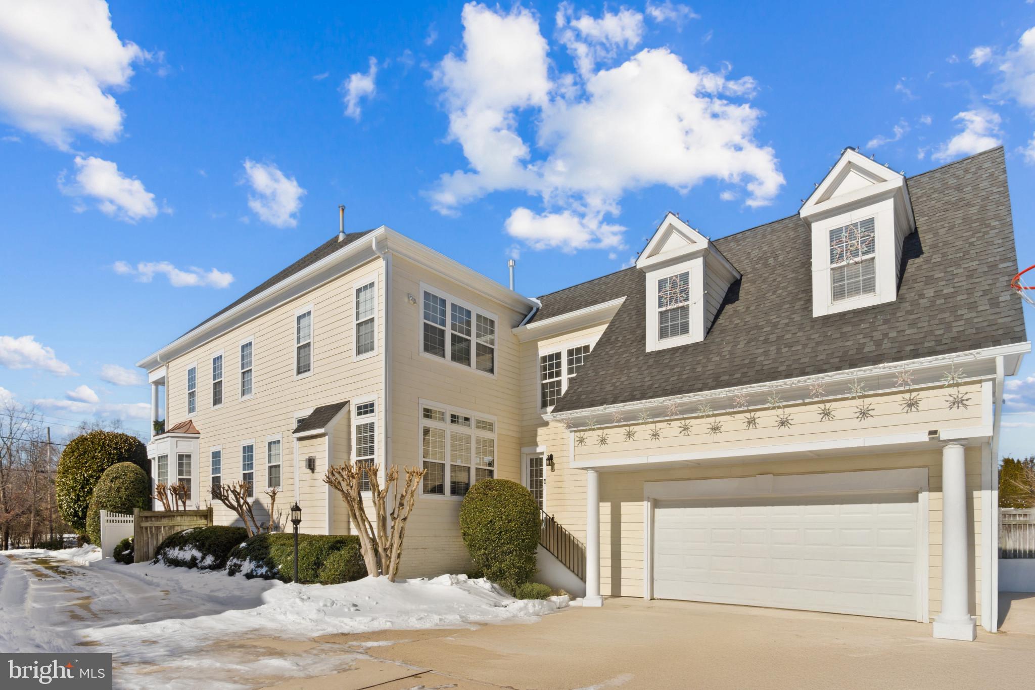 9223 Ox Road Lorton, VA 22079 - Photo 48 of 52 2 car garage with shelving and storage