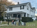 a front view of a house with balcony