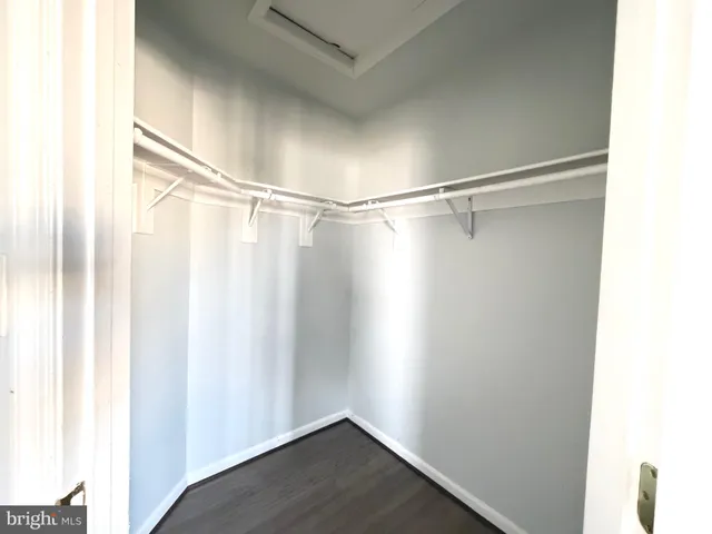 a view of a room with racks on the wall