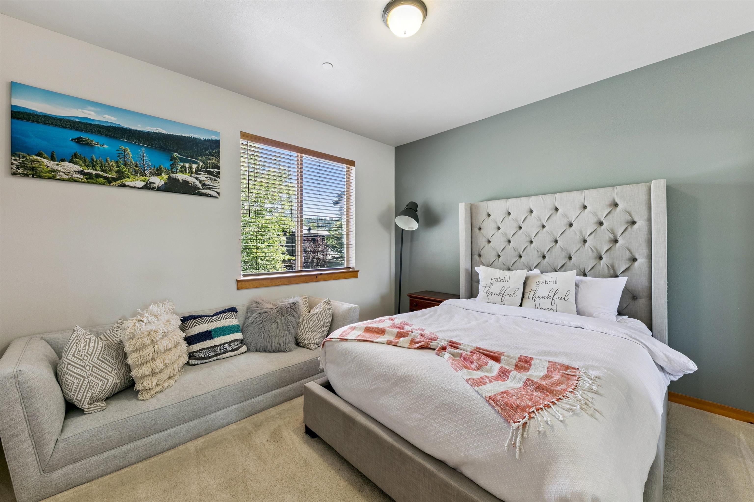 10592 Boulders Road, Unit 8 Truckee, CA 96161 - Photo 19 of 28 a bedroom with a bed couch and window