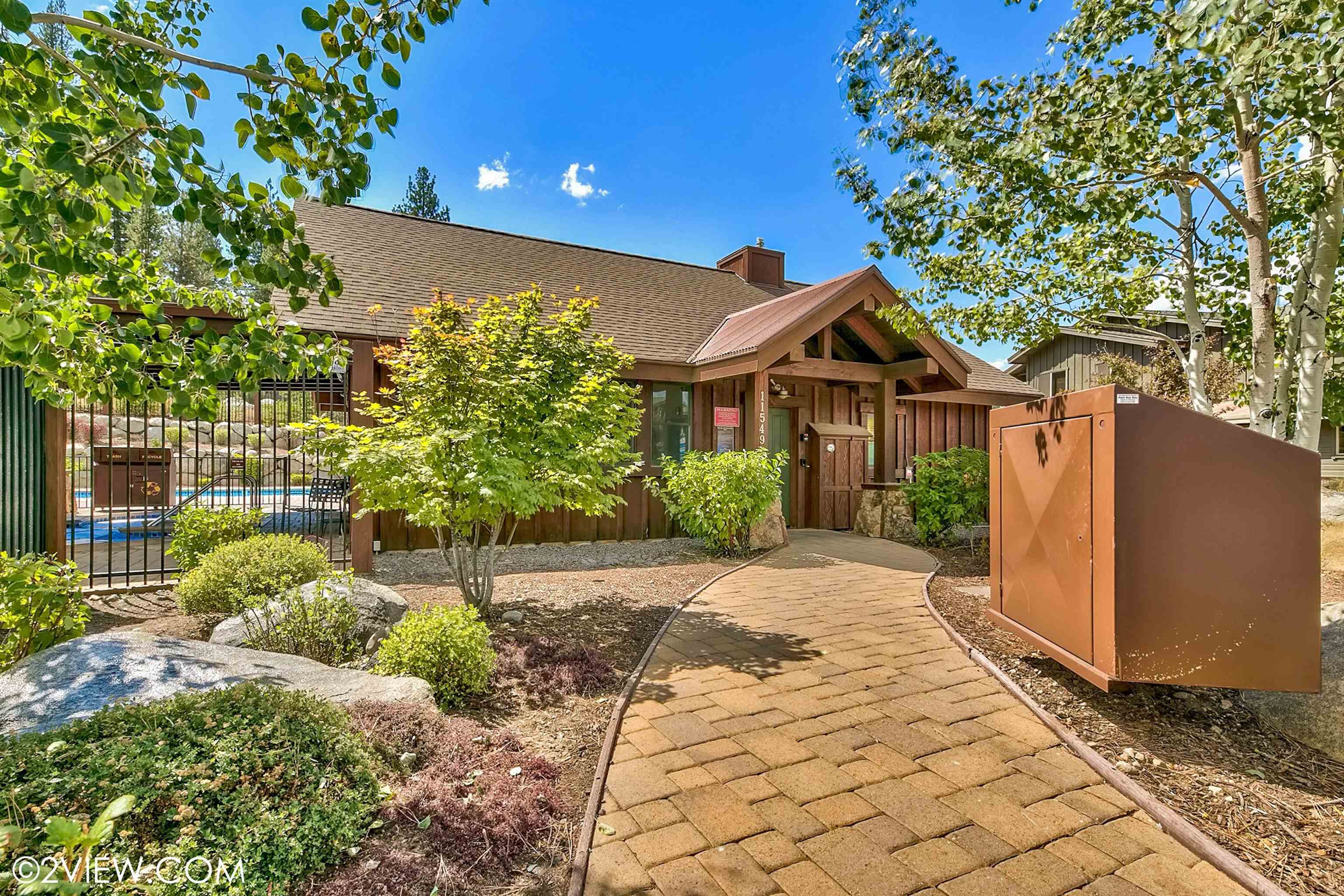 10592 Boulders Road, Unit 8 Truckee, CA 96161 - Photo 23 of 28 a front view of a house with a garden