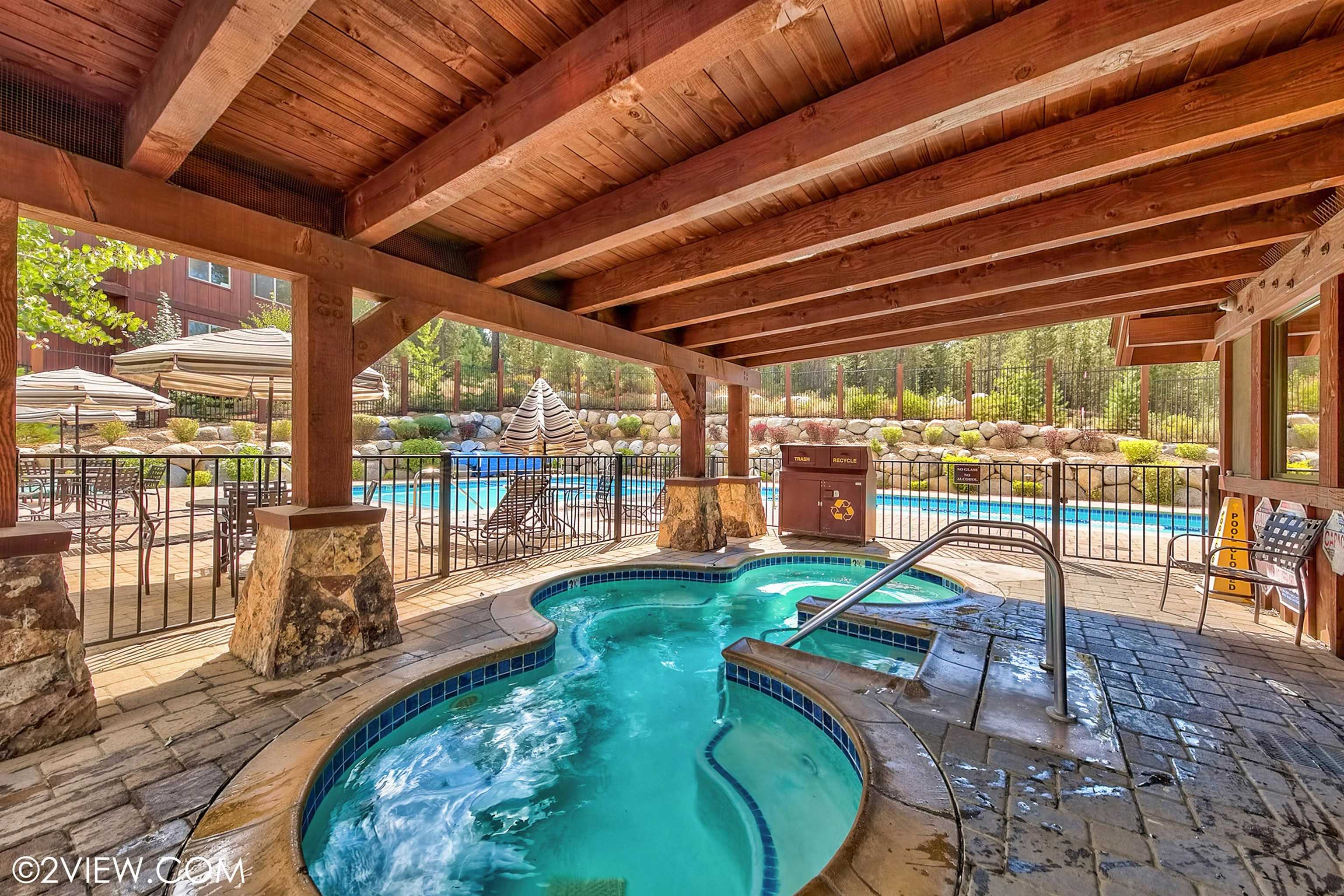 10592 Boulders Road, Unit 8 Truckee, CA 96161 - Photo 25 of 28 a swimming pool with outdoor seating