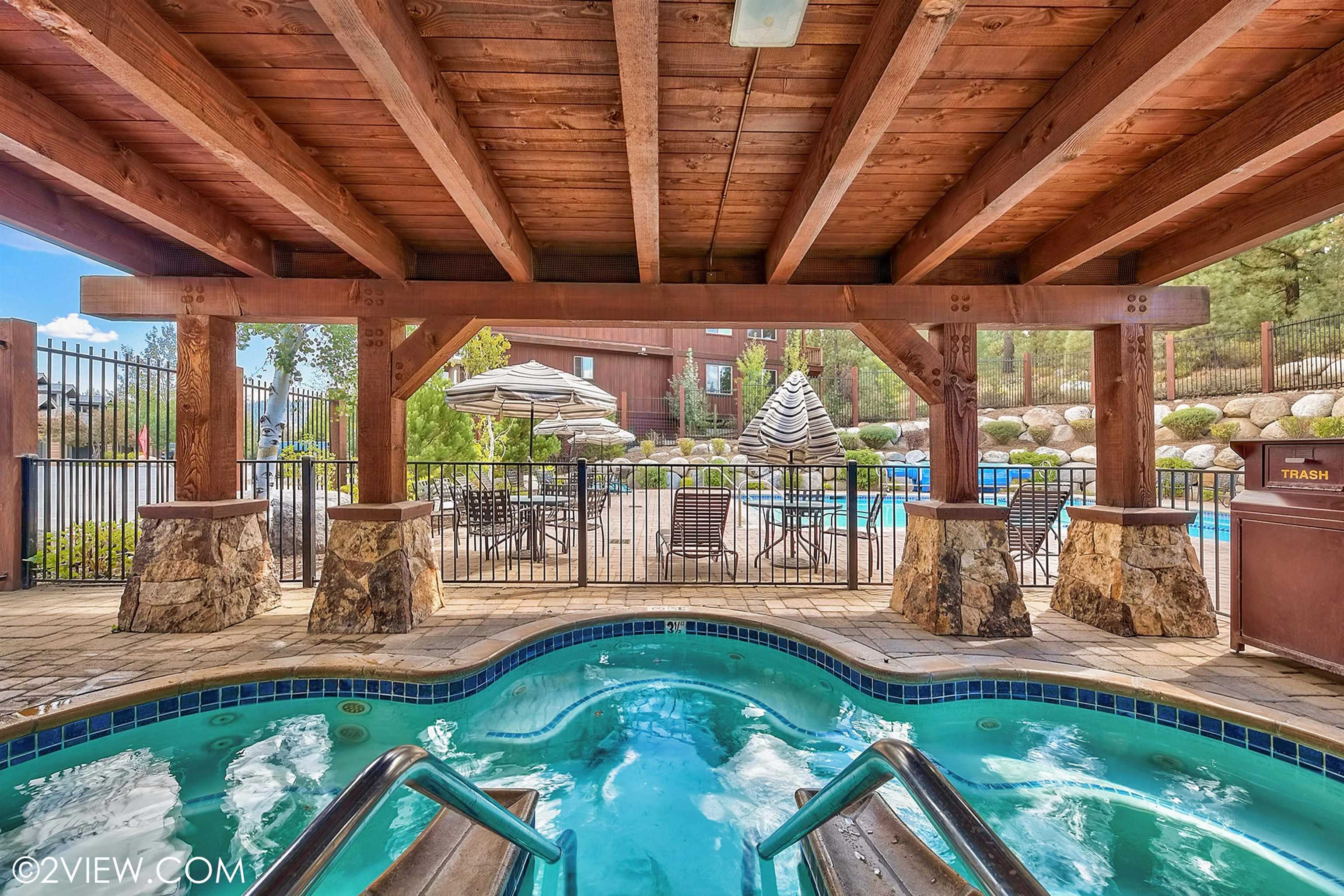 10592 Boulders Road, Unit 8 Truckee, CA 96161 - Photo 26 of 28 a view of a swimming pool with a patio